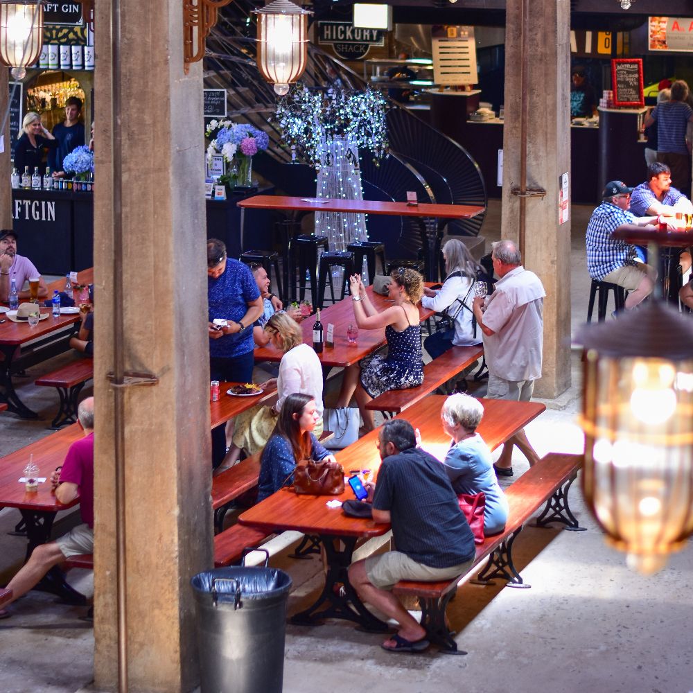 people having lunch in the street